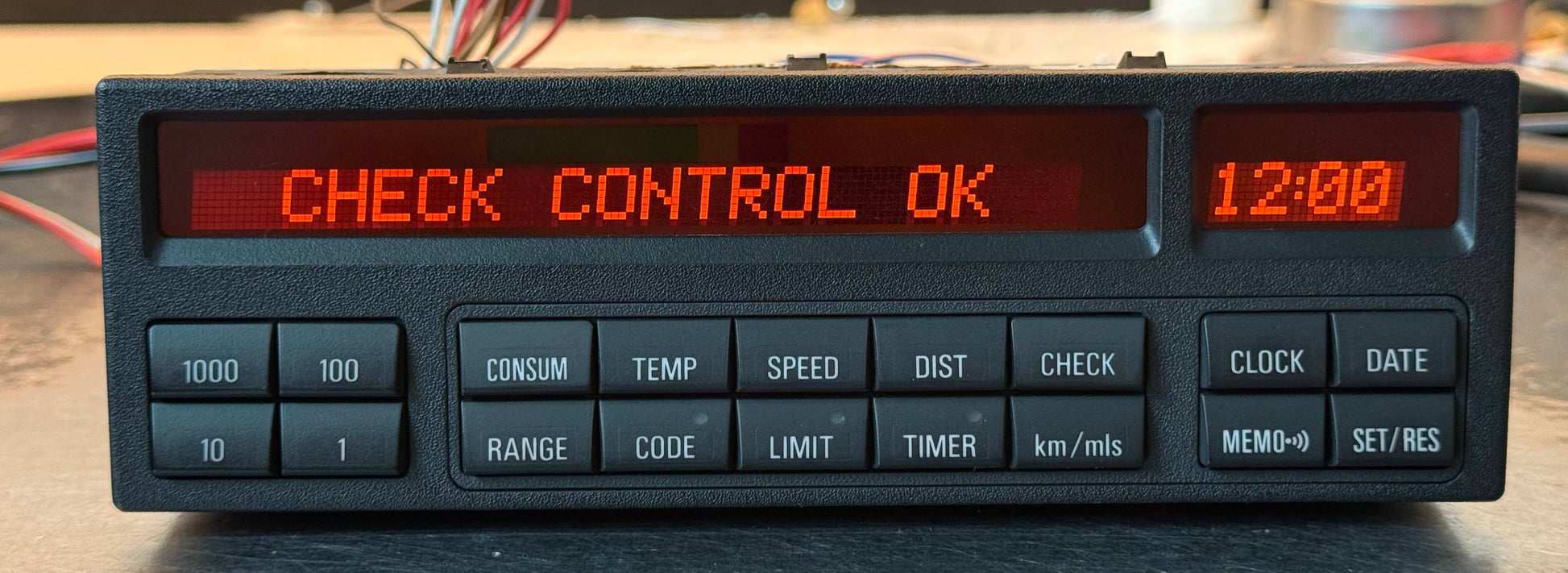 Digital control panel with LED display on a table