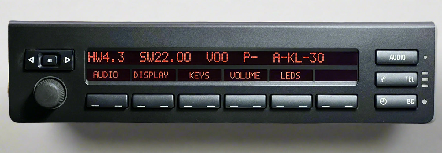 Car stereo with digital display on a dark surface