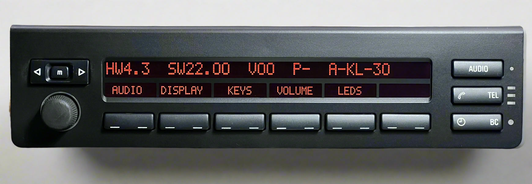 Car stereo with digital display on a dark surface